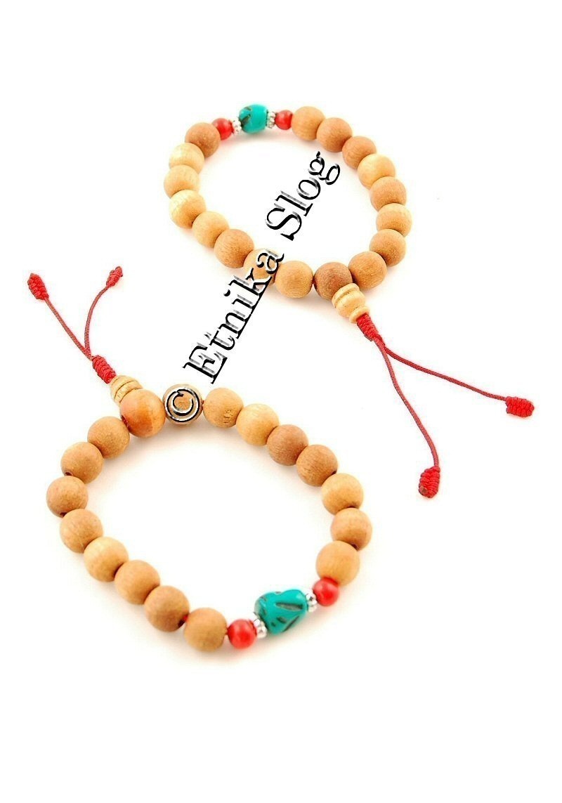 BRACCIALETTO TIBETANO IN PERLE LEGNO CHIARO Ø 9MM BRACCIALETTO TIBETANO IN PERLE LEGNO CHIARO Ø 9MM